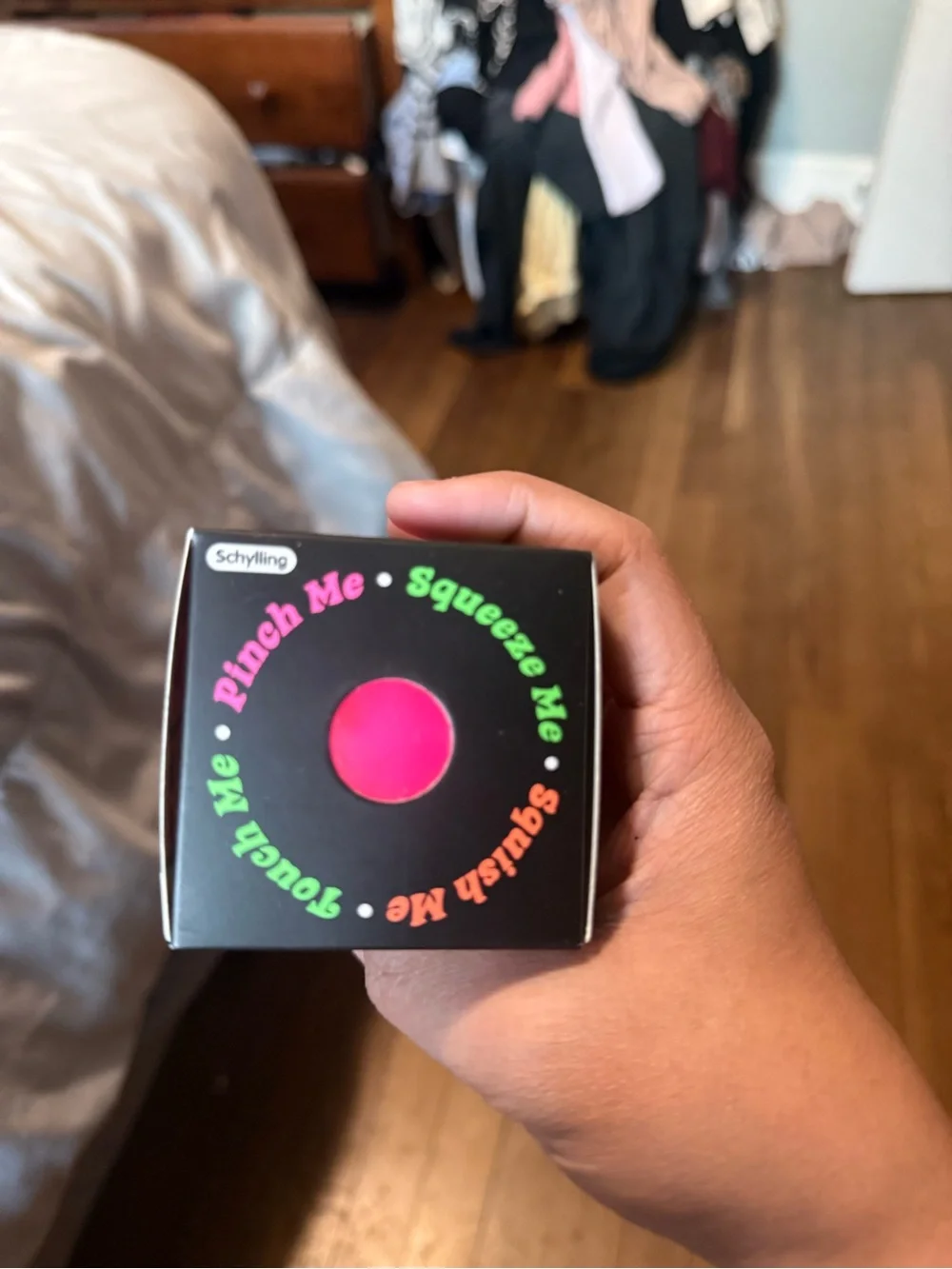 The Nee Doh Groovy Globi Stress Ball - Bright Pink & Orange Packaging